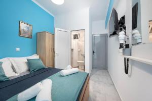 Postel nebo postele na pokoji v ubytování Lefteris Apartment