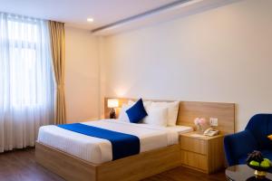 Postel nebo postele na pokoji v ubytování Sandals Star Hotel
