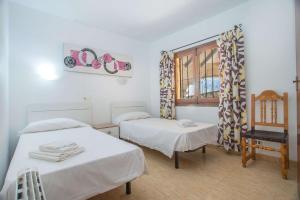 Posteľ alebo postele v izbe v ubytovaní Villa Sanlio - PlusHolidays