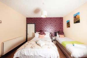 מיטה או מיטות בחדר ב-Warm&Welcoming City Centre Apartments by Meadows 4