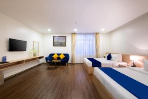 Postel nebo postele na pokoji v ubytování Sandals Star Hotel