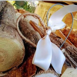 a loaf of bread with a bow on top of it at La Culla di Bacco in Castagnole Monferrato