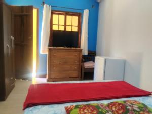 Postel nebo postele na pokoji v ubytování Suíte paraty