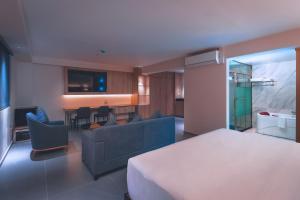 Cama o camas de una habitación en Lyz Business Hotel Piura