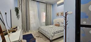 a small bedroom with a bed and a window at Glamstay BatuRakit Instep,Umt,Unisza,Ipg in Kuala Terengganu