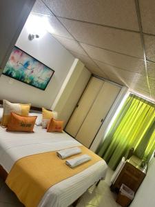Postel nebo postele na pokoji v ubytování Hotel Sulicam