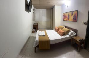 Postel nebo postele na pokoji v ubytování Hotel Sulicam