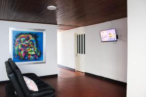 Μια τηλεόραση ή/και κέντρο ψυχαγωγίας στο HOSTAL LIBANO TOLIMA