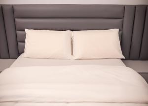 Ένα ή περισσότερα κρεβάτια σε δωμάτιο στο Palm Heights Apartments - Omole Phase 1, Ikeja