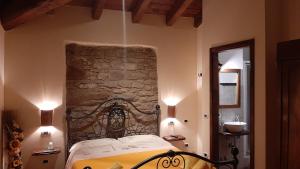 Posteľ alebo postele v izbe v ubytovaní Agriturismo Ca' de' Magnani