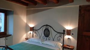 Posteľ alebo postele v izbe v ubytovaní Agriturismo Ca' de' Magnani