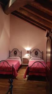 Posteľ alebo postele v izbe v ubytovaní Agriturismo Ca' de' Magnani
