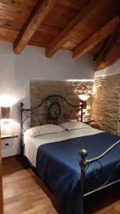 Posteľ alebo postele v izbe v ubytovaní Agriturismo Ca' de' Magnani