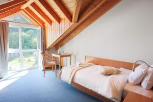Postel nebo postele na pokoji v ubytování Hotel Bessunger Forst + 37 fotografií