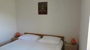 Postel nebo postele na pokoji v ubytování Vacation home Marinići
