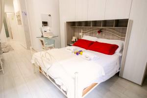 Letto o letti in una camera di Flower's House 24 - Central Apartment - Molfetta