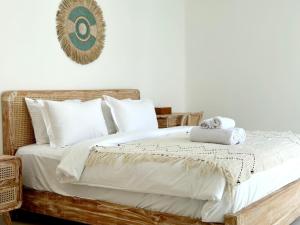 En eller flere senge i et værelse på Fresh D'jove Villa in Uluwatu Bali with Wi-Fi and Pool