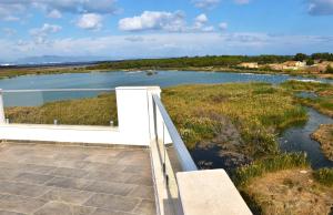 a balcony with a view of a river at Panoramic Penthouse in Mağusa
