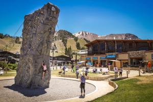 a group of people climbing a rock wall at Courchevel 57 in Mammoth Lakes