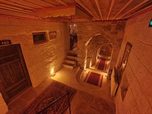 an overhead view of a building with a door and stairs at Euphoria Cave House in Nar