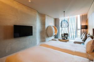 Katil atau katil-katil dalam bilik di 了了礁溪 Vivir Jiaoxi Hotel