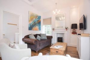 Et tv og/eller underholdning på Historic House On The Bridge