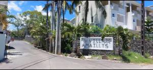 a sign that reads the new apartments on a street at Sea La Vie Villa in Grande Gaube