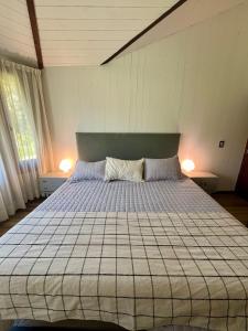Cama ou camas em um quarto em Casa Amapola