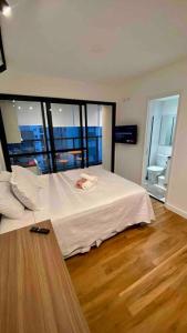 Ліжко або ліжка в номері Apto Studio Perdizes Allianz Pq / PUC