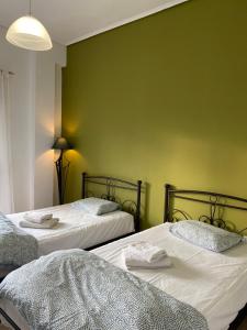 Postel nebo postele na pokoji v ubytování Nefeli Β1 apartment