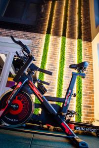 a bike parked in front of a brick wall at Belle View Apart Hotel in Turda