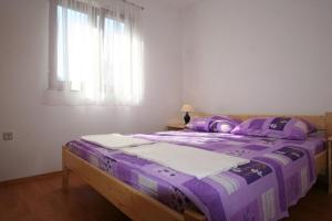 Postel nebo postele na pokoji v ubytování Apartment Ruzmarin