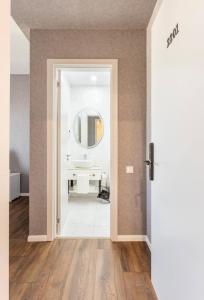 Koupelna v ubytování Hotel Babi + 37 fotografií