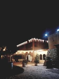 a building with lights on it at night at Villa Carmela in Sessa Aurunca