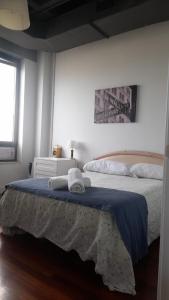 Postelja oz. postelje v sobi nastanitve Apartamento de 2 habitaciones entre La Peseta y Carabanchel Alto con vistas
