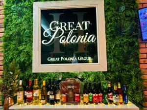 a sign for a great palapa with bottles of alcohol at Great Polonia Świdnica City Center in Świdnica