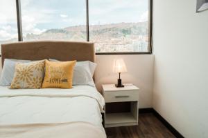 Sky Suites - Stunning Location with a great view of La Paz客房内的一张或多张床位