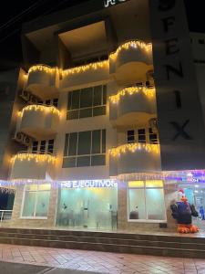 a building with lights on the front of it at Hotel Fenix in Cúcuta