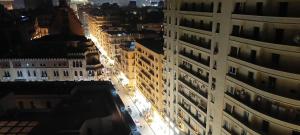 an overhead view of a city street at night at Hotel luna in Cairo