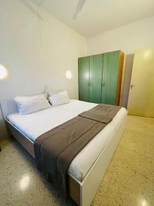 Katil atau katil-katil dalam bilik di SunnyGem Retreat