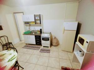 Кухня или мини-кухня в 08apto Residencial Praia de Capão da Canoa

