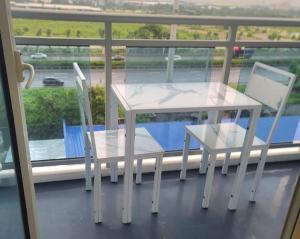 Výhled na bazén z ubytování Azure Urban Resort Condo San Fernando Pampanga nebo okolí