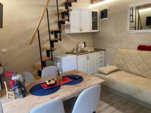 Kuchyň nebo kuchyňský kout v ubytování Apartmani kod Pančevca