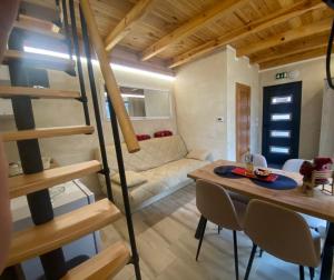 Postel nebo postele na pokoji v ubytování Apartmani kod Pančevca