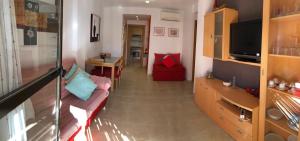 Kuchnia lub aneks kuchenny w obiekcie Apartamento junto al mar Los Marineros con acceso independiente por terraza