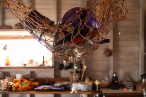 a basket filled with dishes on top of a table at Casa Satori in Barra de Valizas
