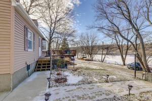 a porch of a house with snow on the ground at Worcester Home on Indian Lake with Shared Boat Dock! in Worcester
