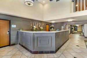 a lobby with a large island in the middle at Best Western Plus Monterey Inn in Monterey