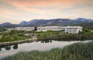a view of the campus from the river at Hilton Dalaman Sarigerme Resort & Golf in Dalaman