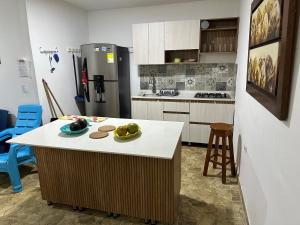 Kuchyň nebo kuchyňský kout v ubytování Cabaña #5 en Condominio Mar de Coveñas